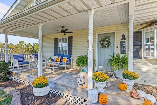 exterior space with covered porch and ceiling fan