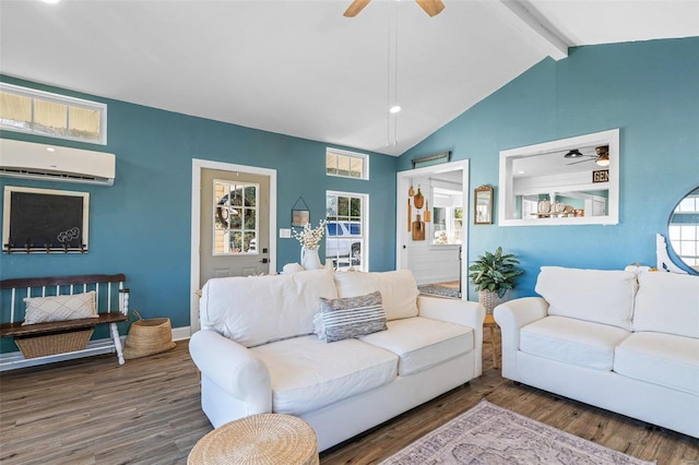 living room with lofted ceiling with beams, ceiling fan, dark wood-type flooring, and a wall unit AC