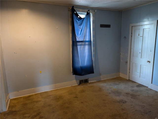 view of carpeted entrance foyer