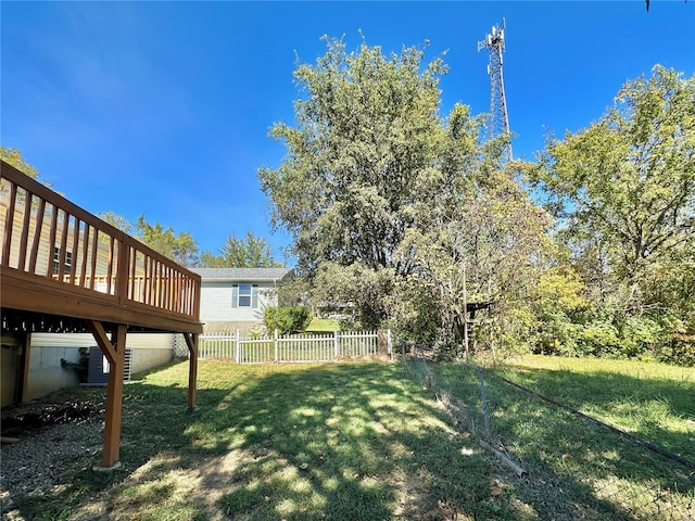 view of yard with a wooden deck