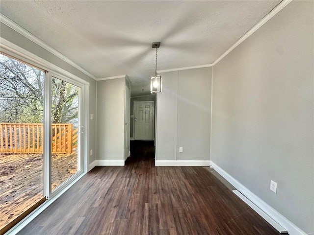 unfurnished dining area featuring crown molding, a textured ceiling, and dark hardwood / wood-style flooring