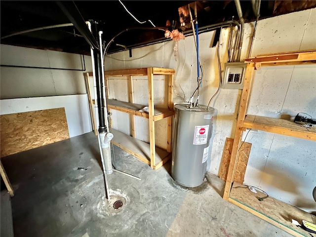 utility room featuring electric water heater