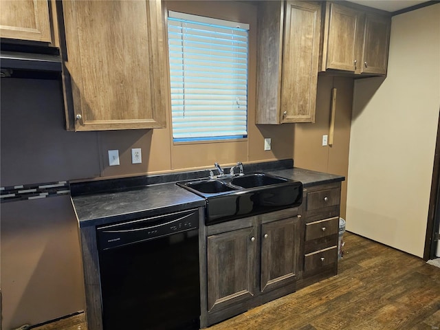 kitchen featuring sink, dishwasher, and dark hardwood / wood-style flooring