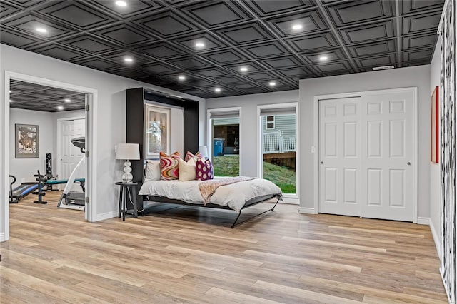 bedroom with light hardwood / wood-style floors