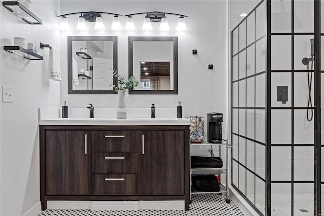 bathroom featuring vanity and tiled shower