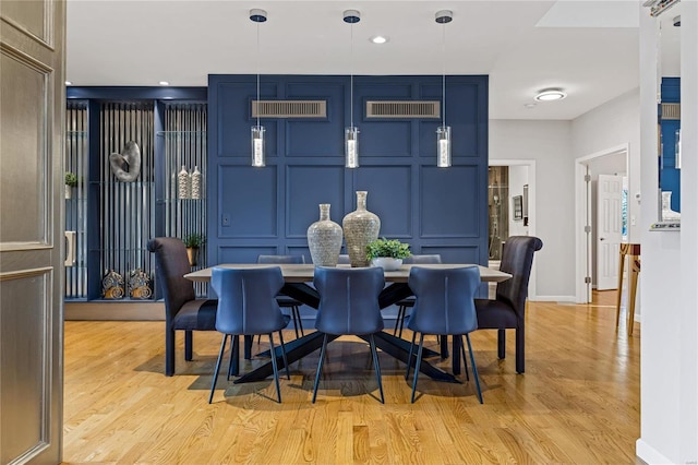 dining room with light wood-type flooring