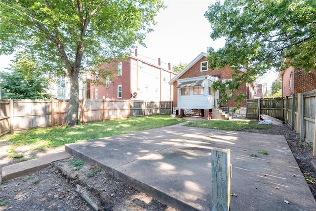 view of yard with a patio area