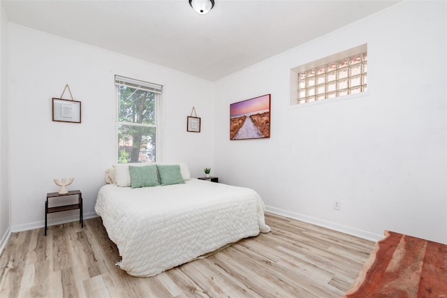 bedroom featuring light wood-type flooring