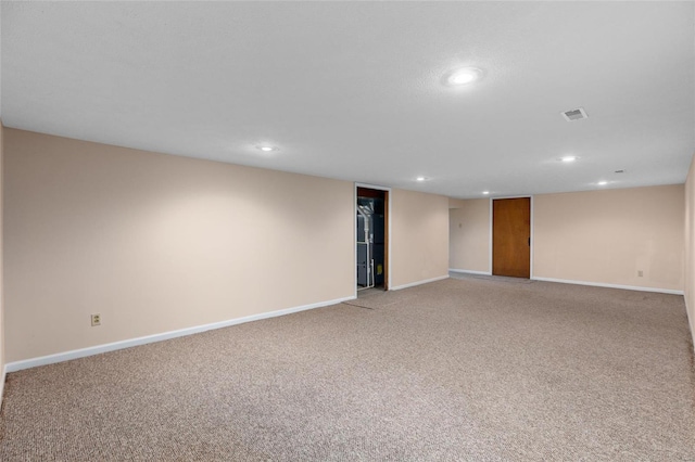 basement with light colored carpet