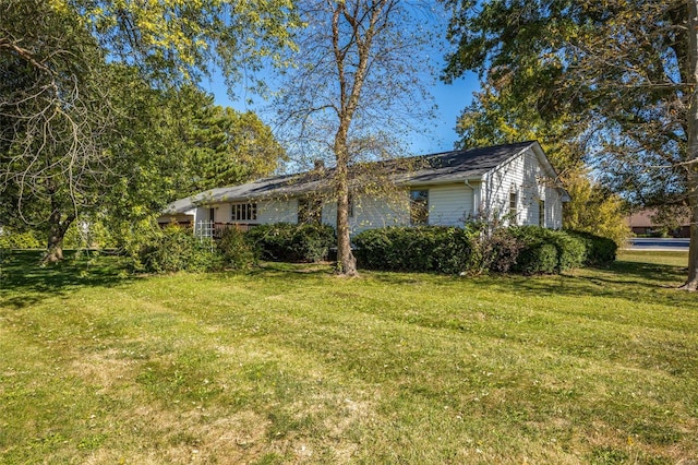 exterior space with a lawn