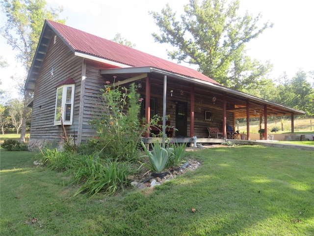 exterior space featuring a front yard