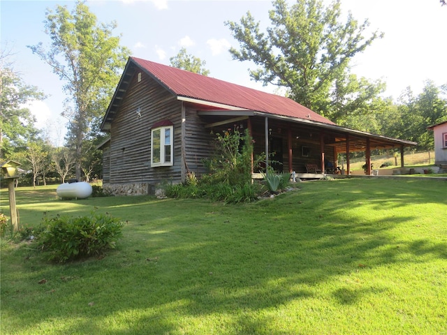 view of property exterior featuring a yard