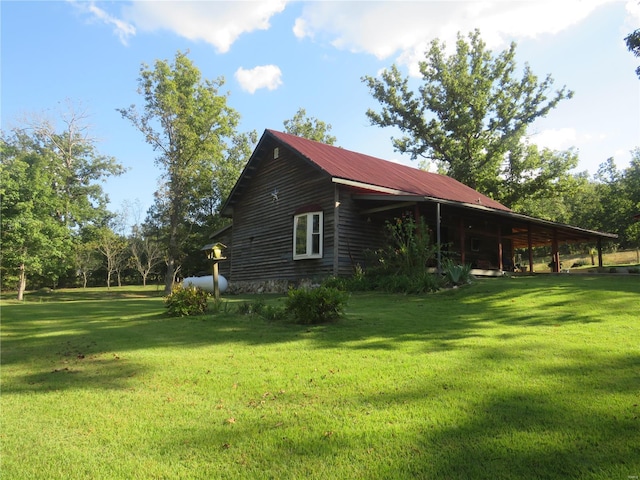 view of property exterior featuring a yard