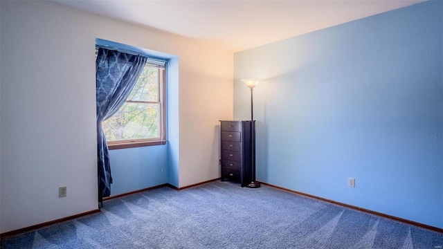 unfurnished bedroom featuring carpet flooring