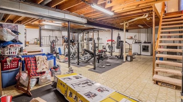 exercise room with independent washer and dryer