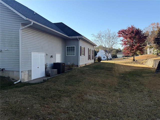 view of property exterior featuring a yard