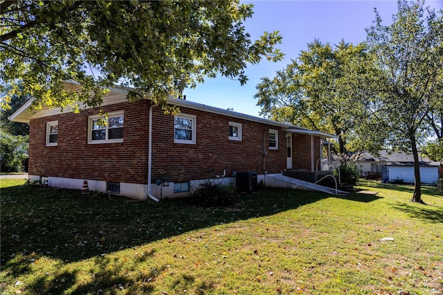 back of house with a yard