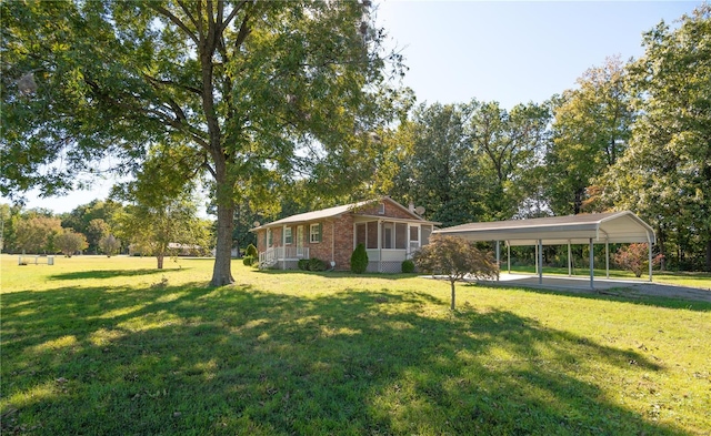 view of yard featuring a carport