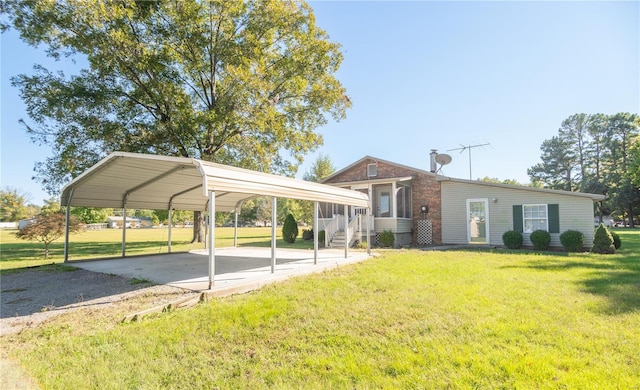 view of parking / parking lot featuring a lawn and a carport