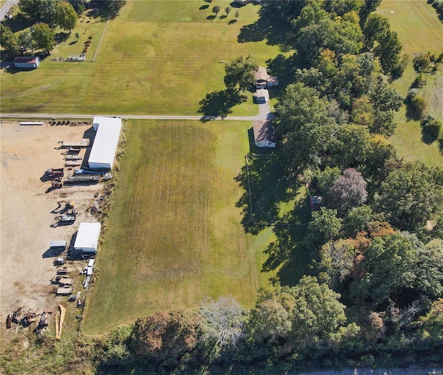 birds eye view of property featuring a rural view