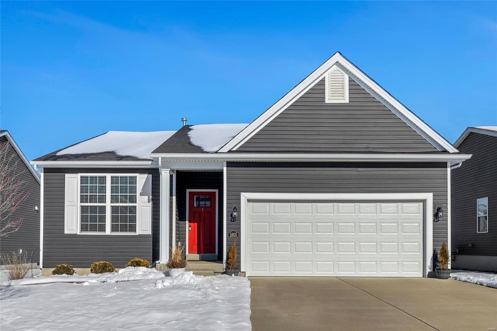 view of front of home with a garage