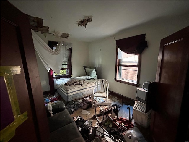 bedroom featuring multiple windows