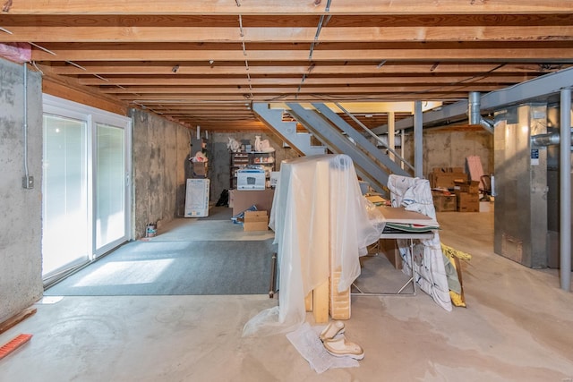 basement featuring heating unit