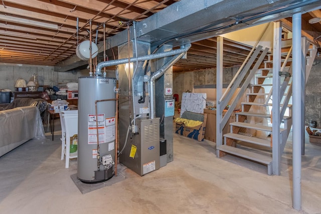 basement with water heater and heating unit