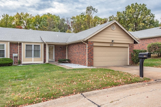 ranch-style house with a front lawn and a garage