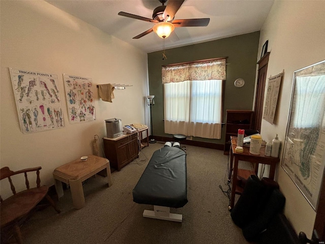 living area featuring ceiling fan and light colored carpet