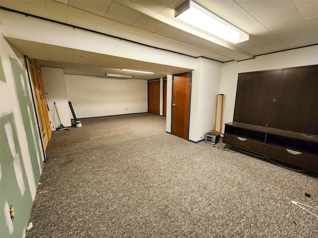 basement with carpet flooring