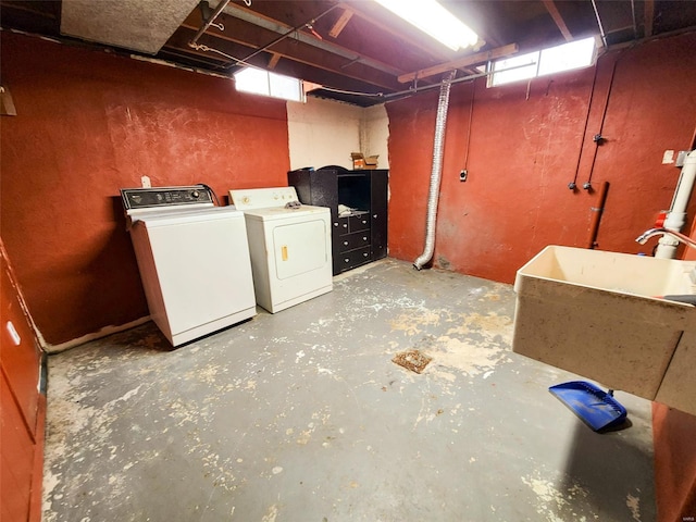 clothes washing area featuring independent washer and dryer