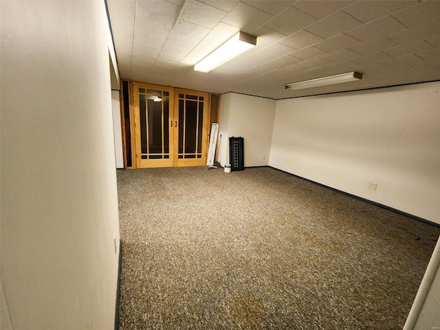 basement with carpet flooring