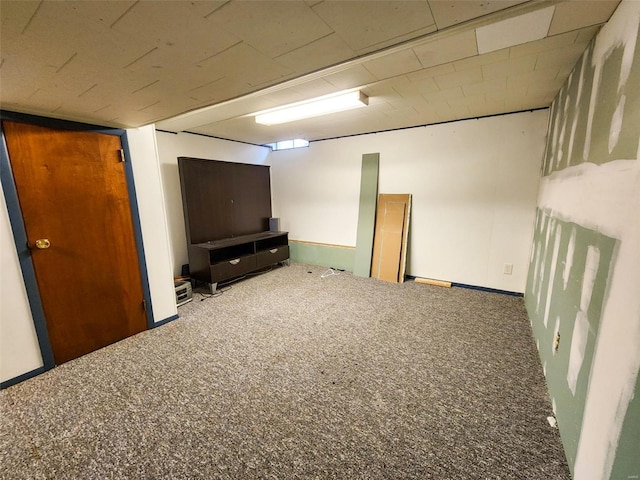 basement featuring carpet flooring