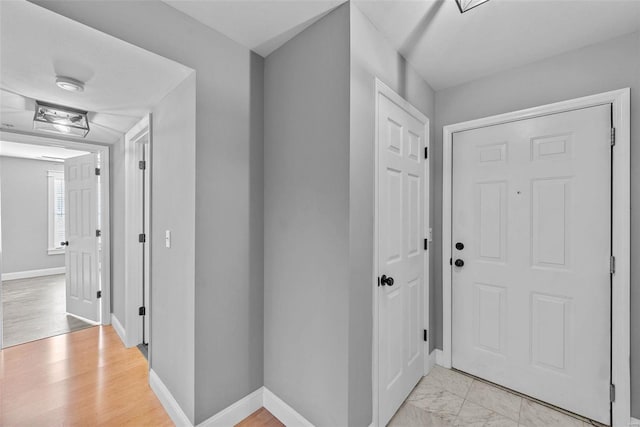 entrance foyer with light hardwood / wood-style flooring