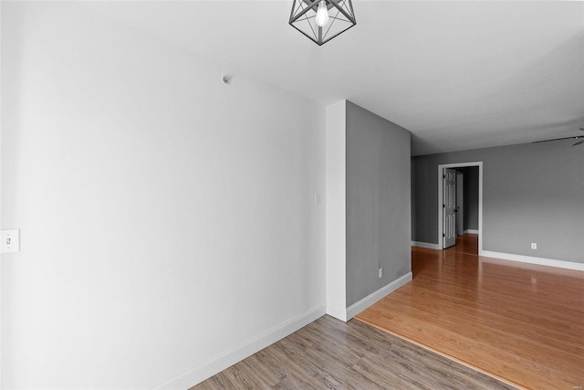 spare room featuring hardwood / wood-style floors