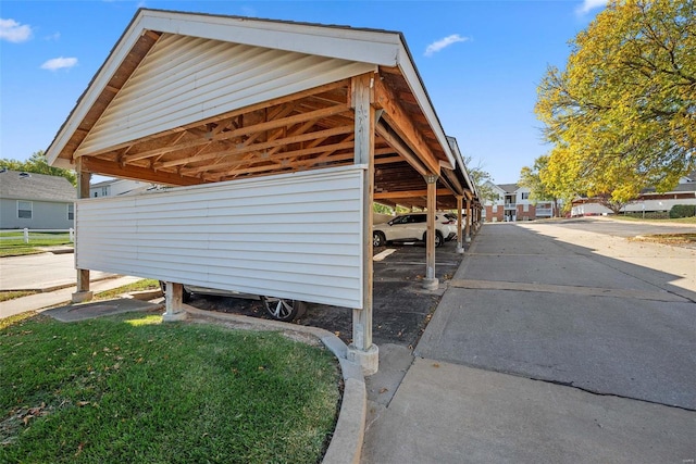 view of home's exterior featuring a carport