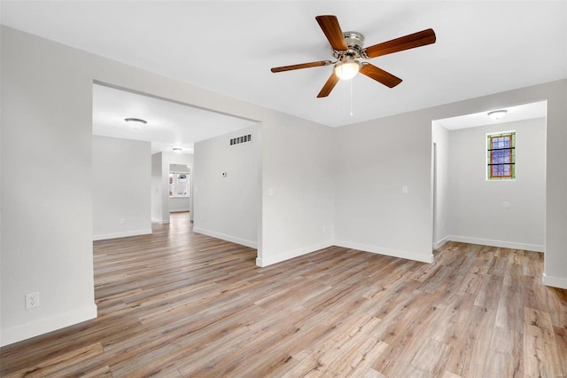 unfurnished room featuring ceiling fan and light hardwood / wood-style flooring