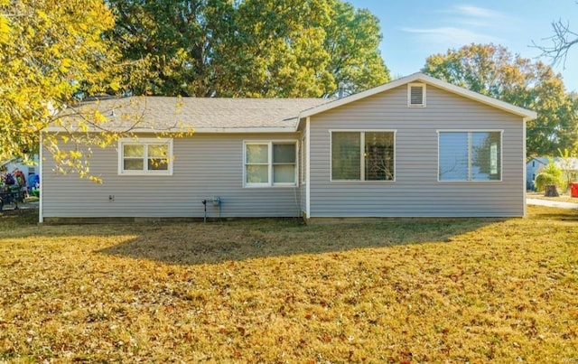 view of home's exterior featuring a lawn