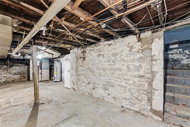 basement featuring water heater and heating unit