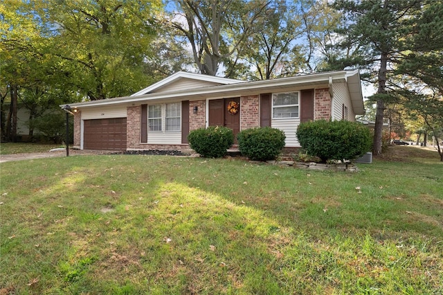 single story home featuring a front lawn and a garage