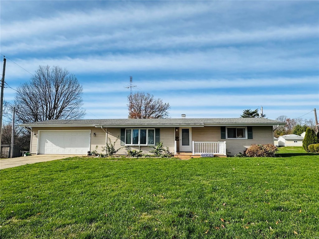 ranch-style house with a front lawn and a garage