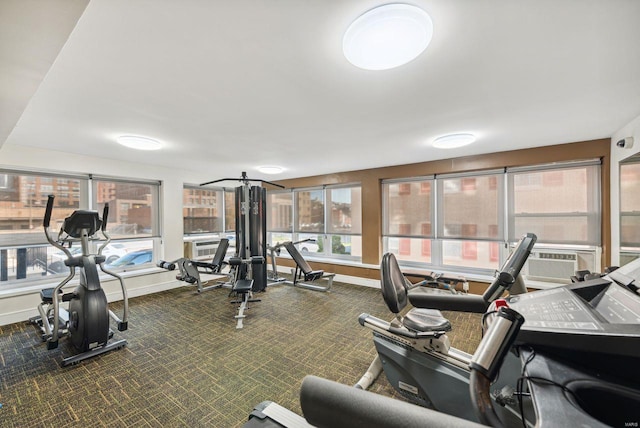 workout area with carpet flooring and cooling unit