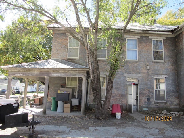 view of front of house with a patio area