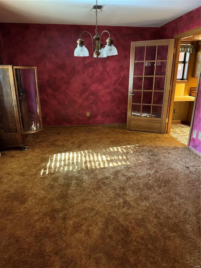 unfurnished dining area with carpet floors