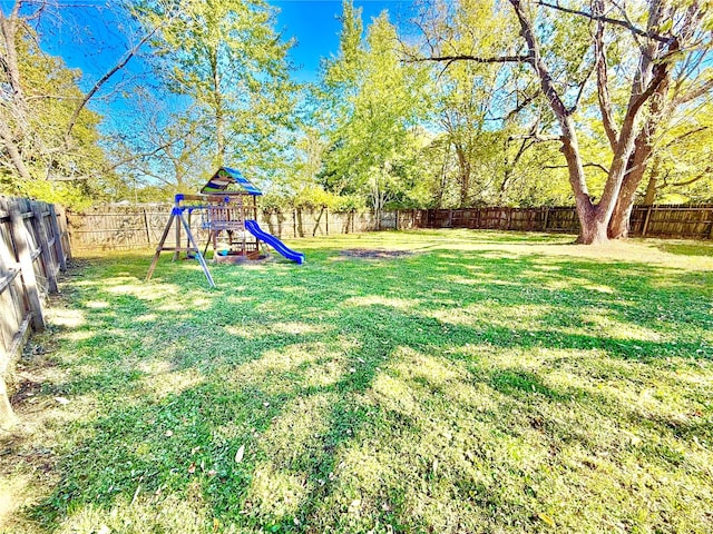 view of yard featuring a playground