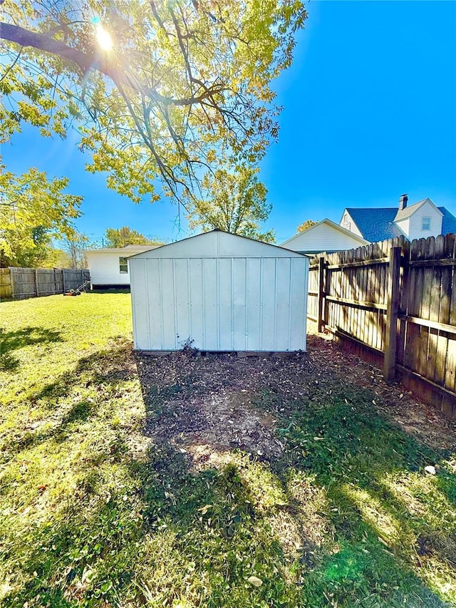 view of outdoor structure with a lawn