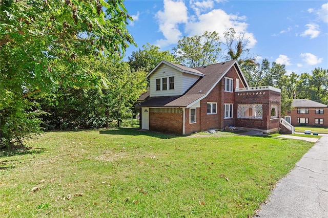 view of property exterior with a balcony and a lawn