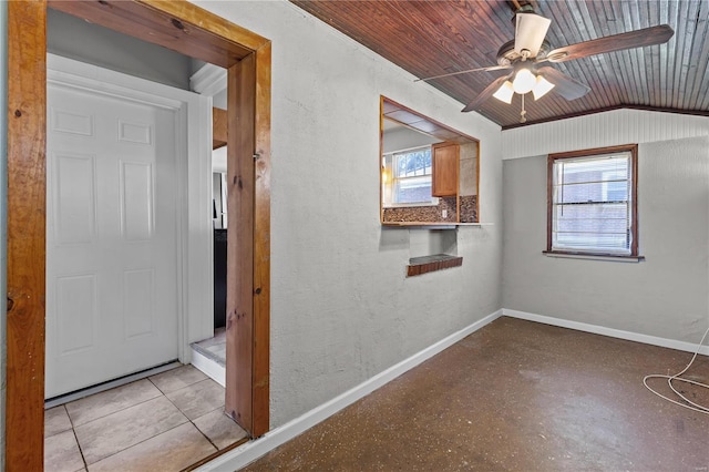 interior space featuring lofted ceiling, wooden ceiling, and ceiling fan