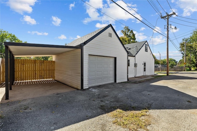 garage with a carport